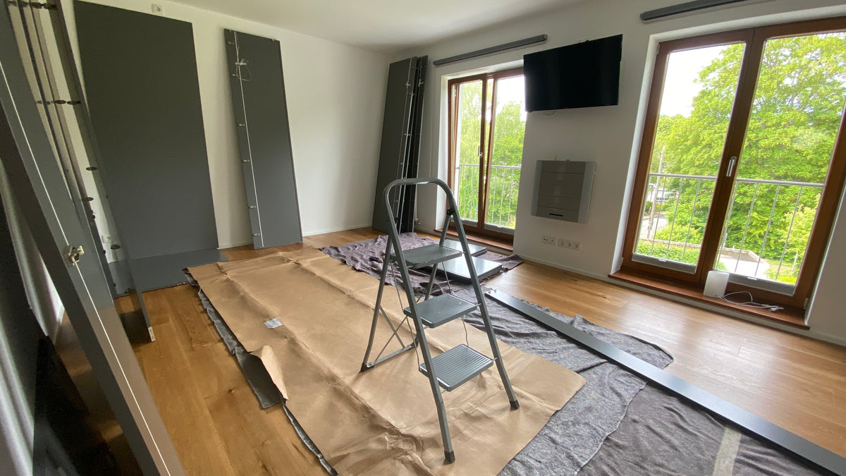 Schlafzimmer in Bochum: Eckschrank und Bettanlage nach der Renovierung